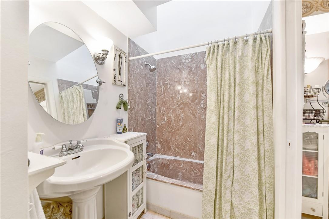 7735 Stanway Place, Unit 7735 Boca Raton, FL 33433 - Photo 17 of 34 a bathroom with a sink toilet and shower