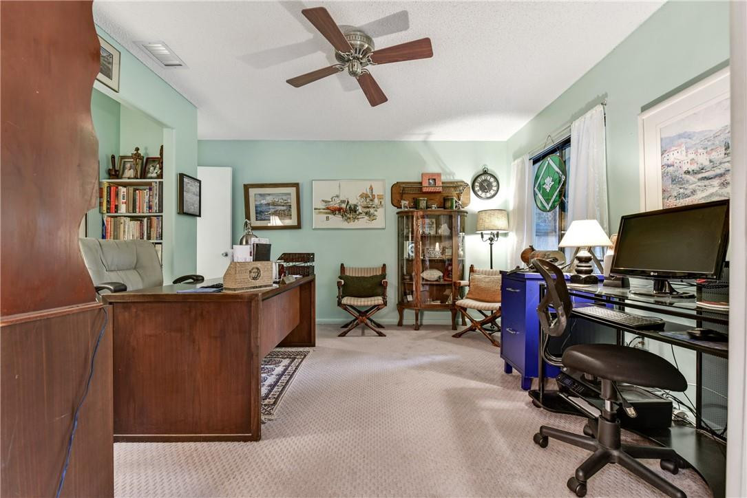 7735 Stanway Place, Unit 7735 Boca Raton, FL 33433 - Photo 26 of 34 a view of a workspace with furniture and a window