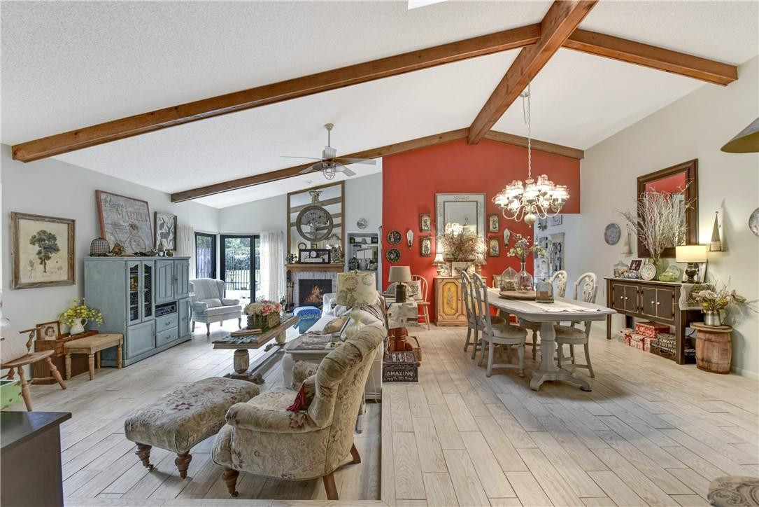7735 Stanway Place, Unit 7735 Boca Raton, FL 33433 - Photo 30 of 34 a living room with furniture and wooden floor