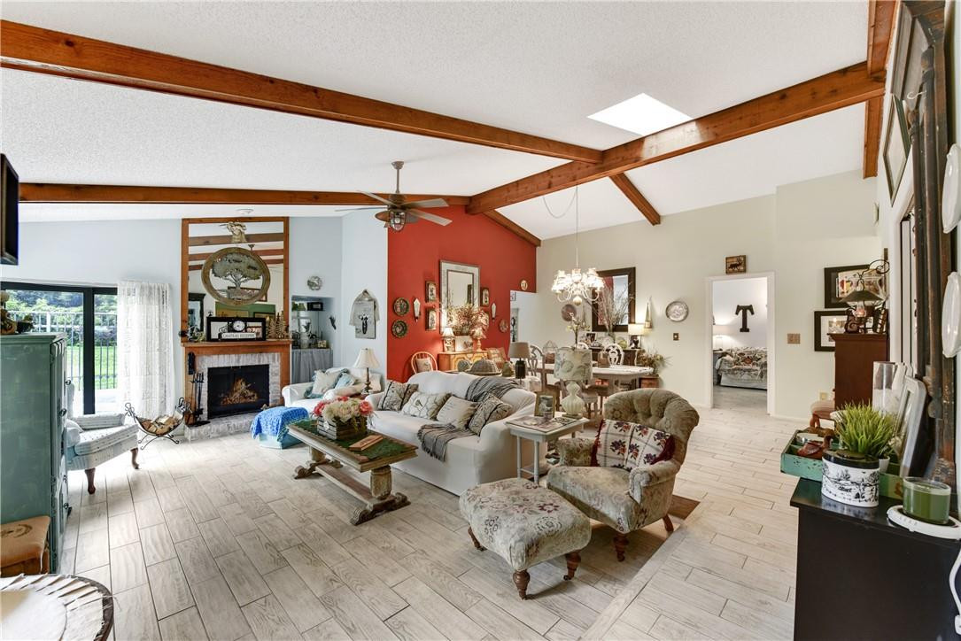 7735 Stanway Place, Unit 7735 Boca Raton, FL 33433 - Photo 33 of 34 a living room with furniture and large windows