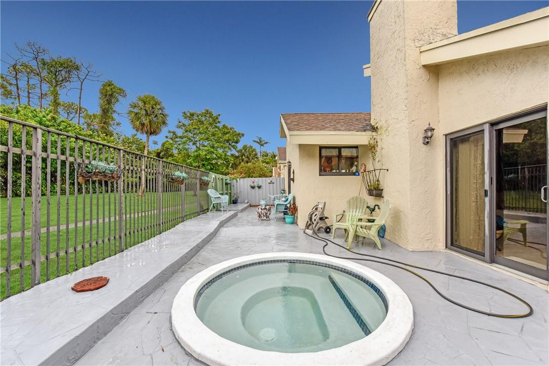 7735 Stanway Place, Unit 7735 Boca Raton, FL 33433 - Photo 10 of 34 a view of swimming pool having outdoor seating