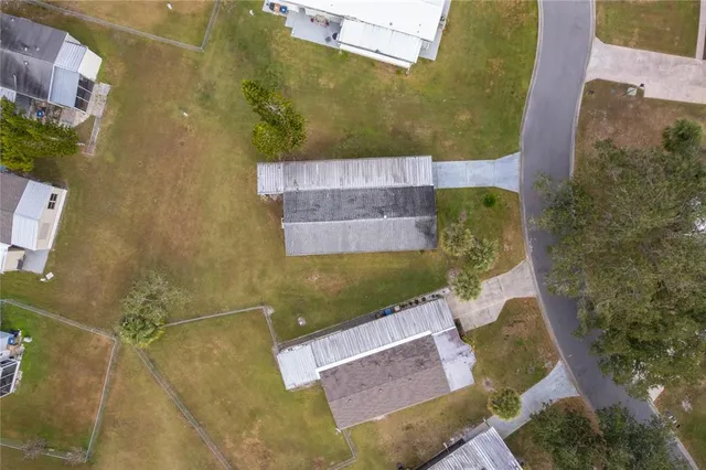 a view of house with entryway and stairs