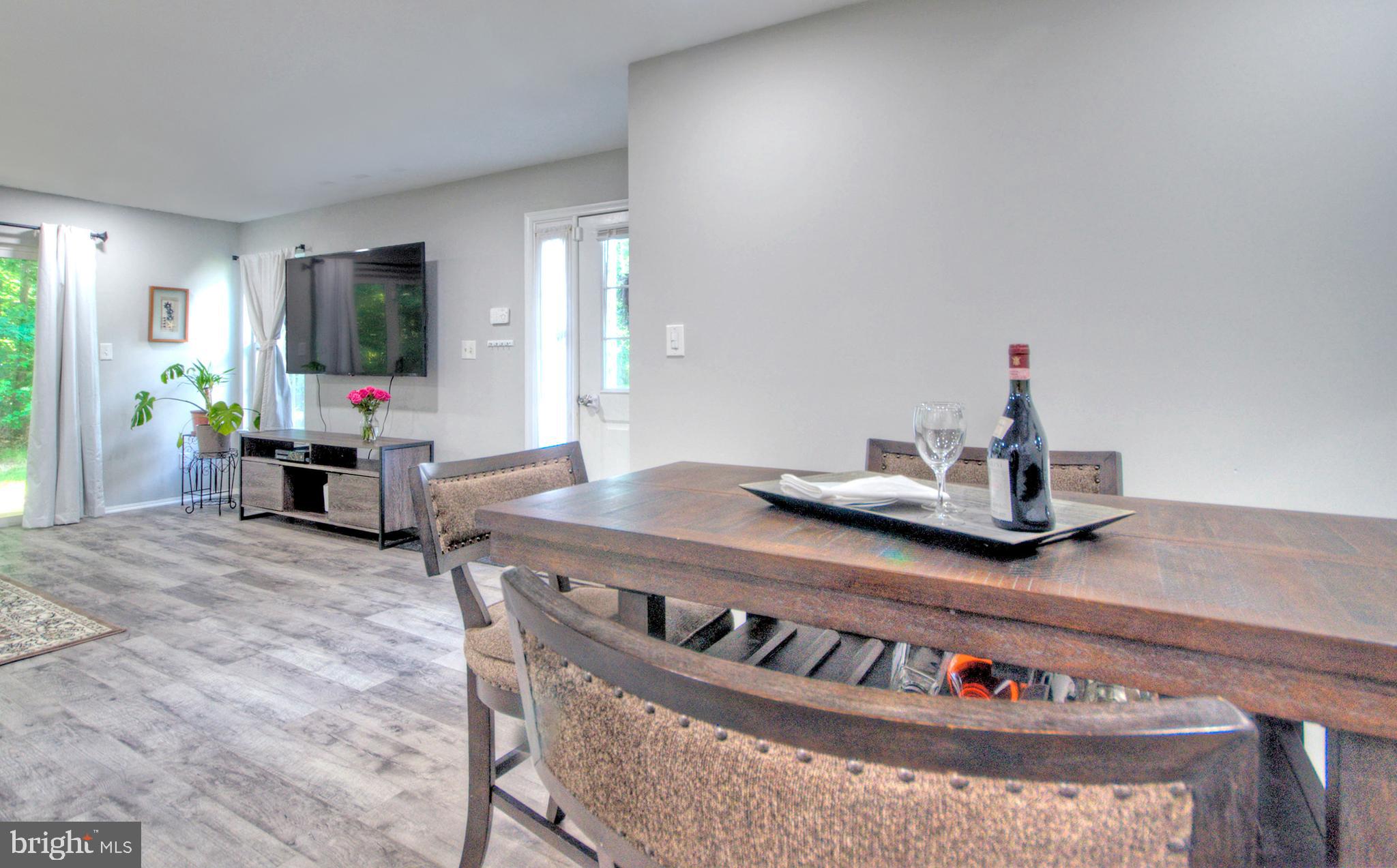 405 Quail Road Marlton, NJ 08053 - Photo 15 of 29 a living room with furniture and flat screen tv