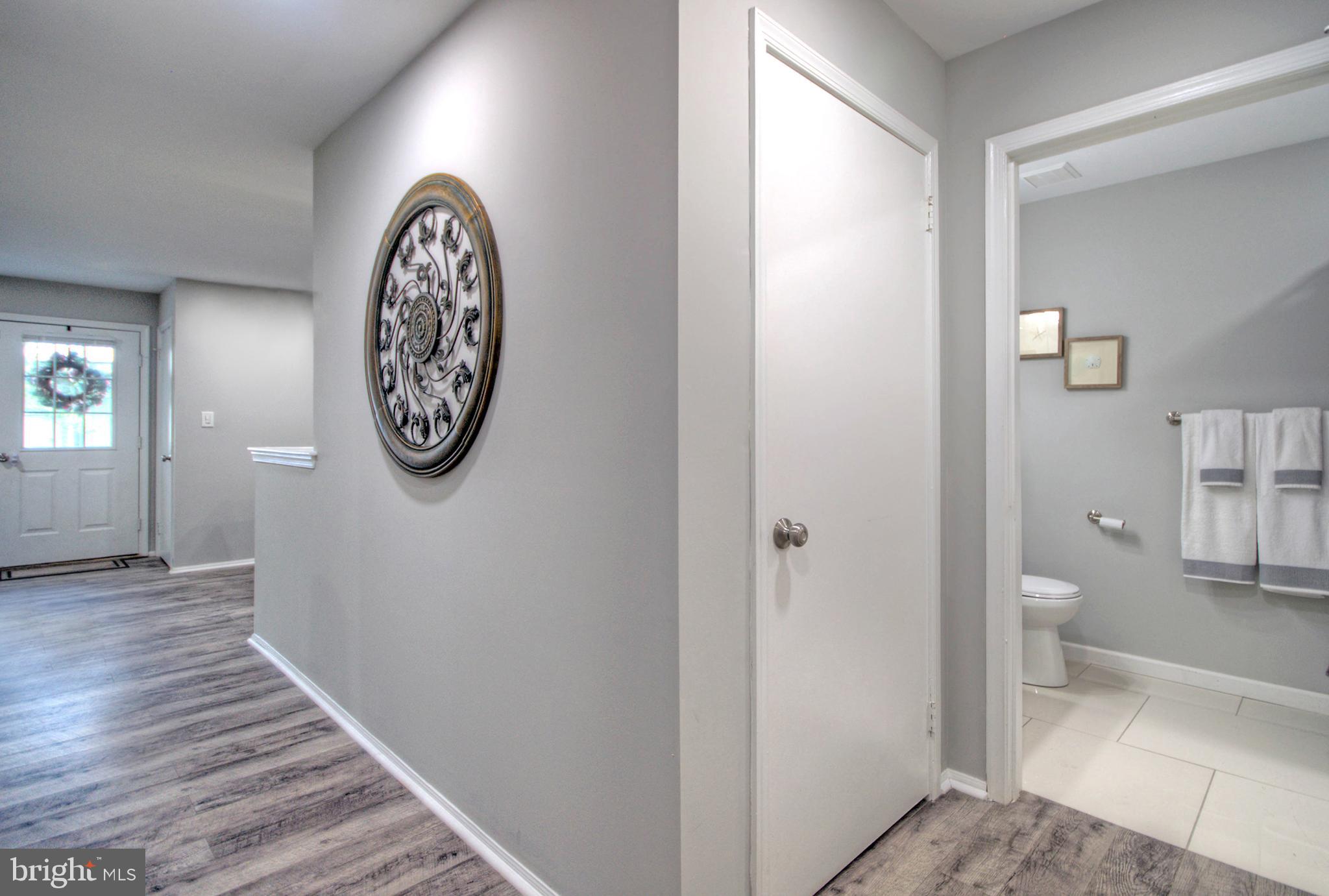 405 Quail Road Marlton, NJ 08053 - Photo 16 of 29 a view of a hallway with wooden floor