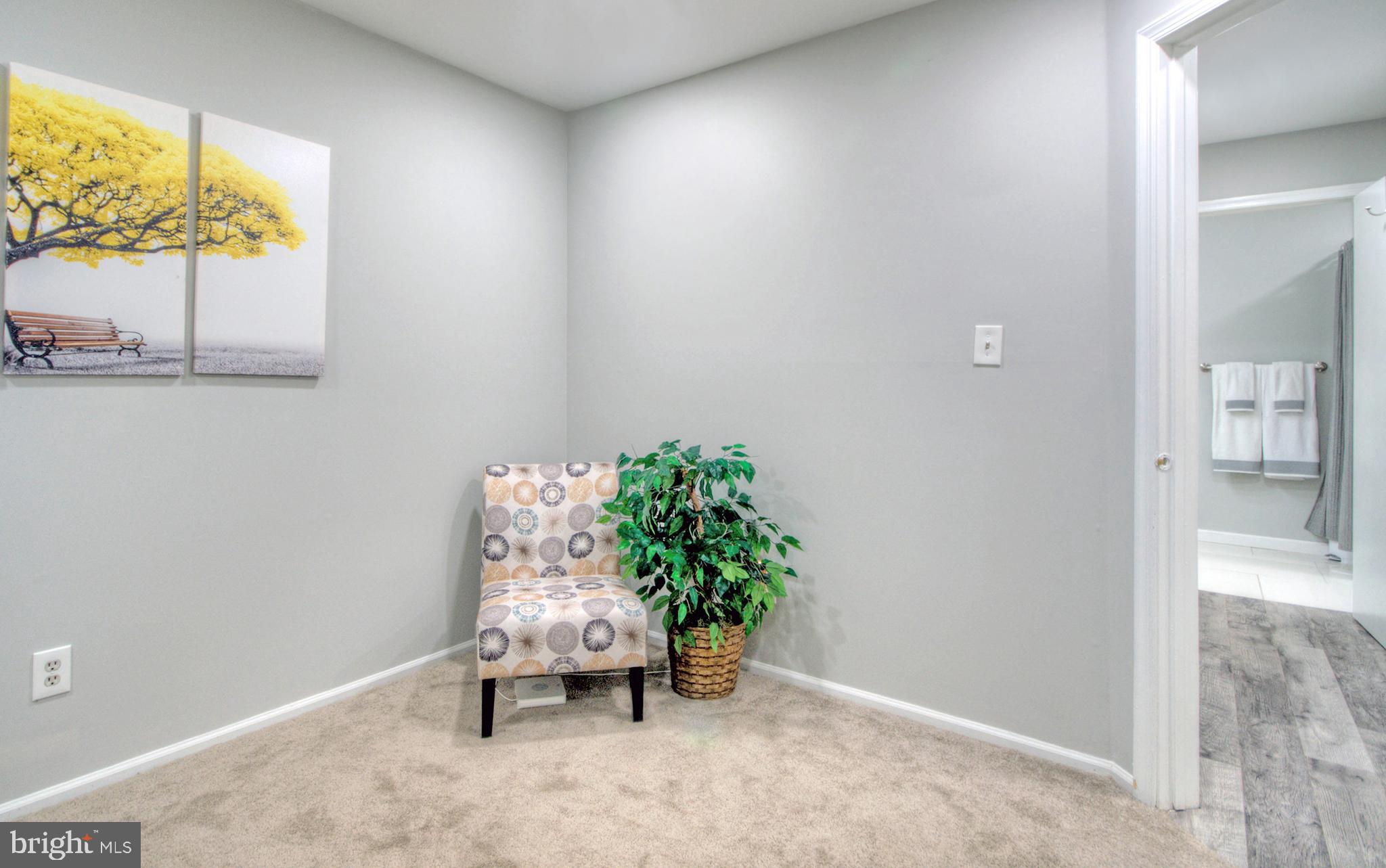 405 Quail Road Marlton, NJ 08053 - Photo 18 of 29 an entryway with furniture and a window