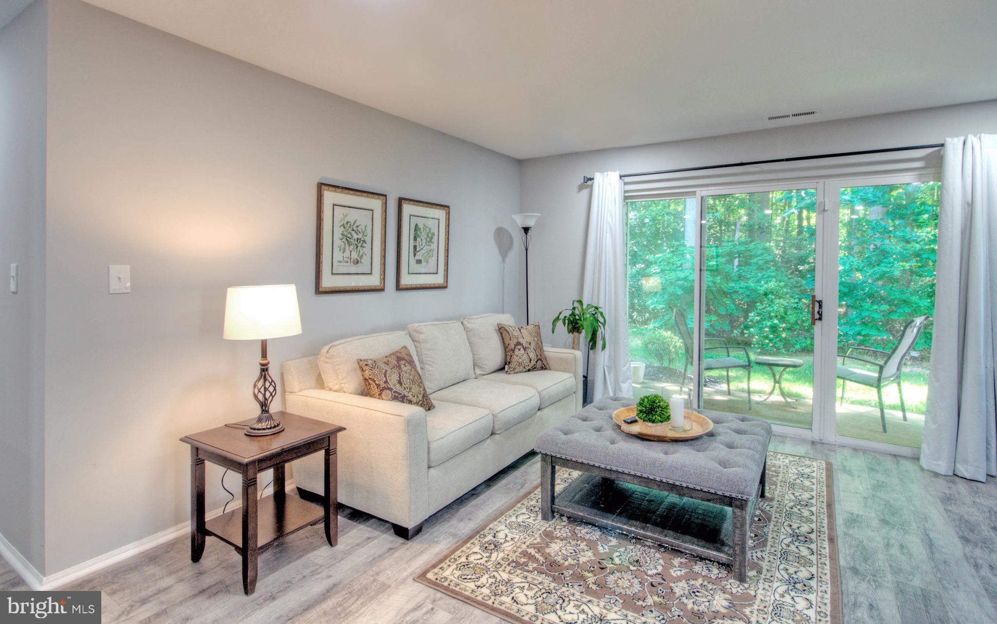 405 Quail Road Marlton, NJ 08053 - Photo 5 of 29 a living room with furniture and a large window
