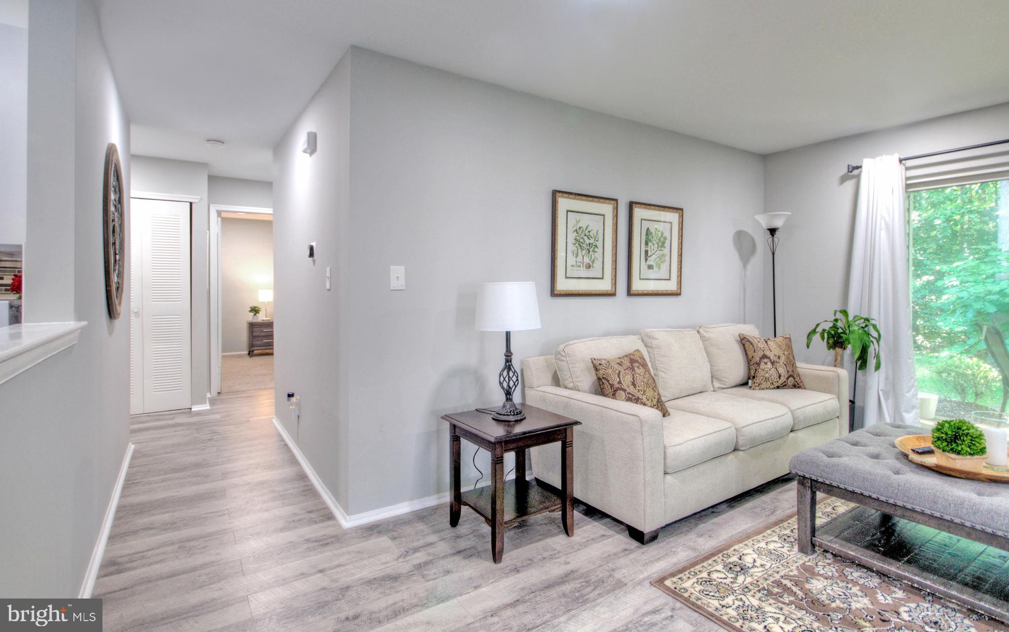 405 Quail Road Marlton, NJ 08053 - Photo 6 of 29 a living room with furniture and a window