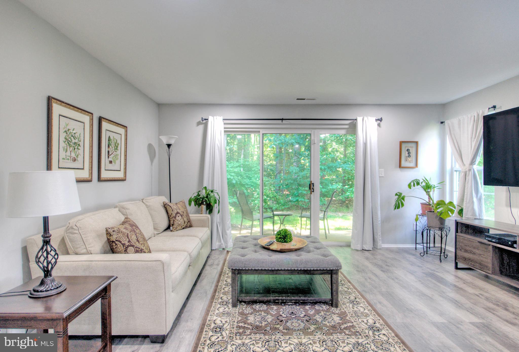 405 Quail Road Marlton, NJ 08053 - Photo 7 of 29 a living room with furniture and a flat screen tv