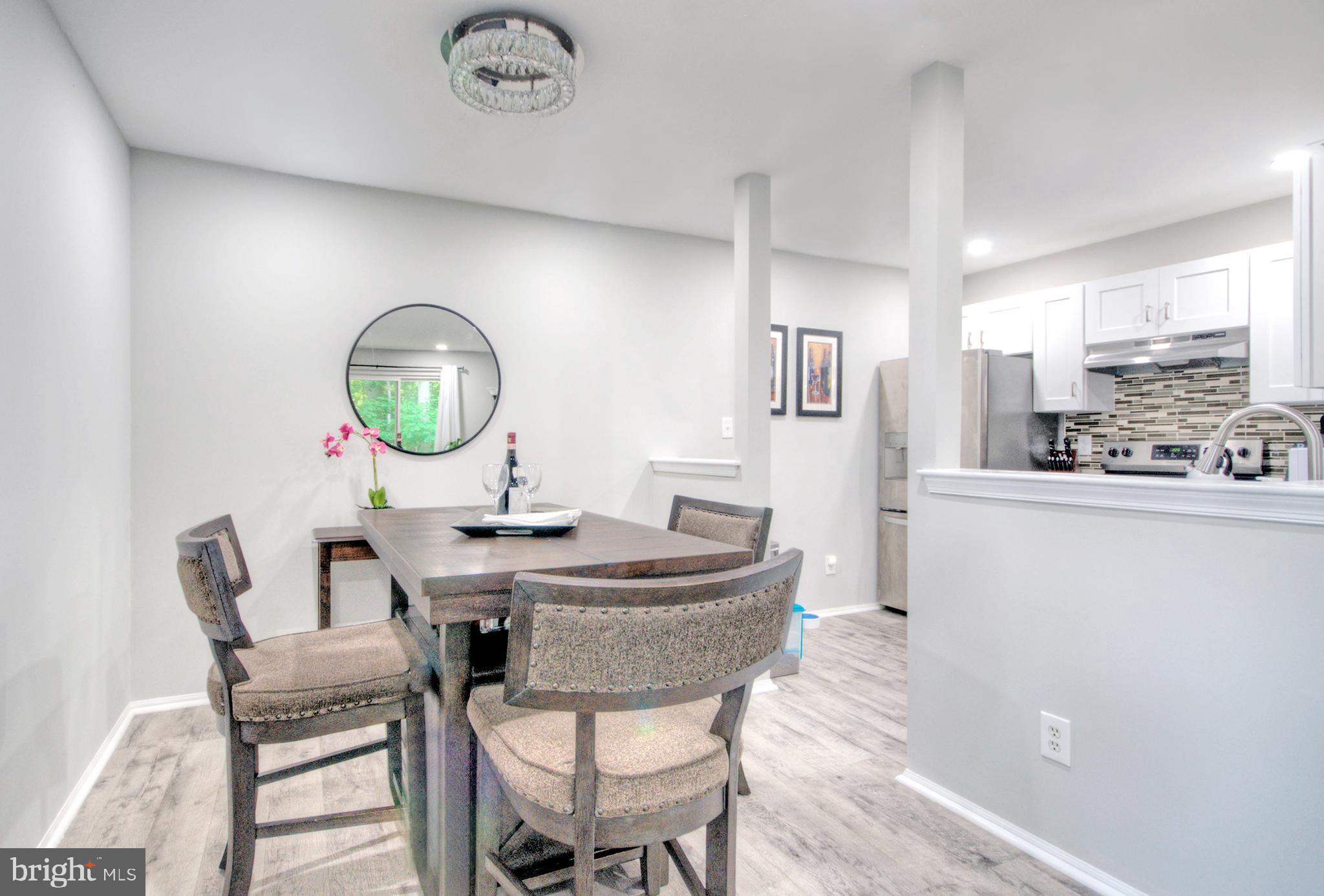405 Quail Road Marlton, NJ 08053 - Photo 10 of 29 a view of a dining room with furniture
