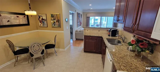 a view of a kitchen and dining room