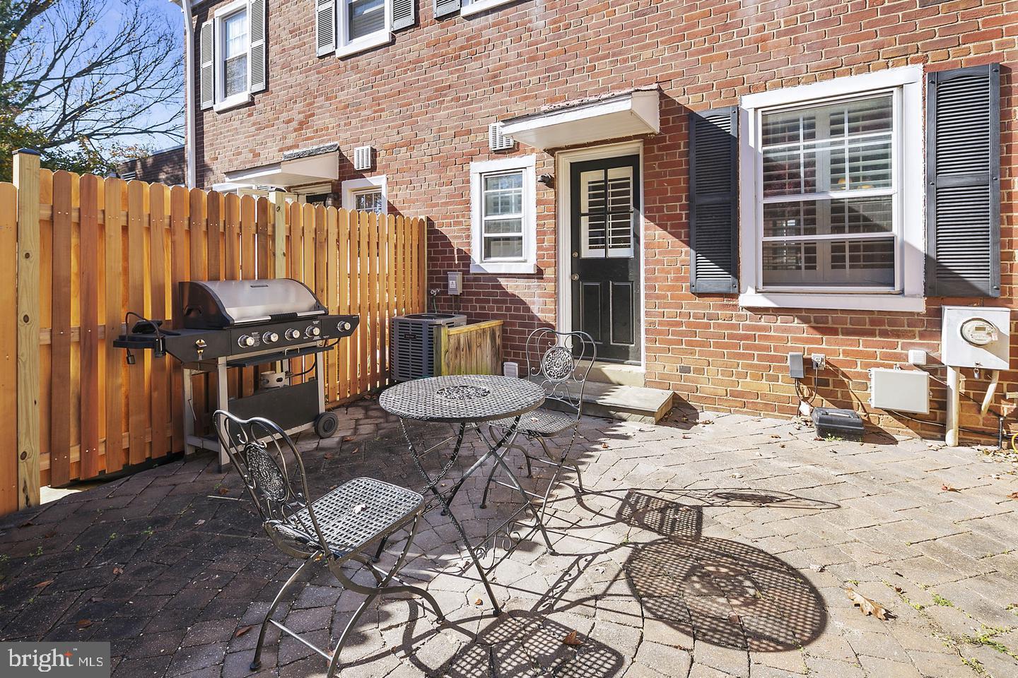 4634 31st Road South Arlington, VA 22206 - Photo 26 of 36 a view of a patio with a table and chairs