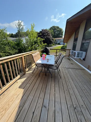 a view of balcony with seating space