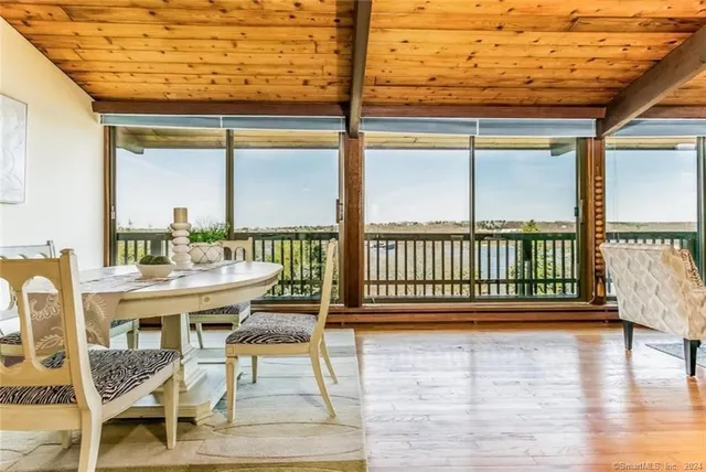 a balcony with wooden floor