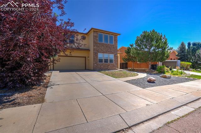 11040 Falling Star Road Fountain, CO 80817 - Photo 3 of 50 View of front of house with a garage