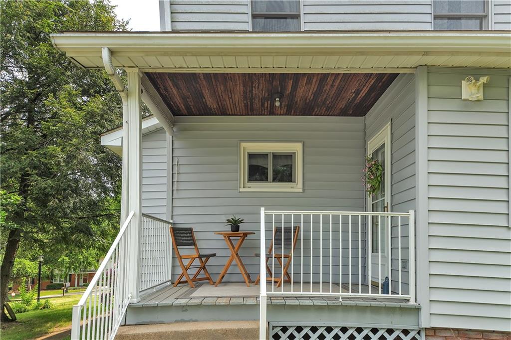 Covered back porch to enjoy relaxation and embrace the peaceful atmosphere of nature.  The spacious 1 acre lot gives a perfect playground for children.