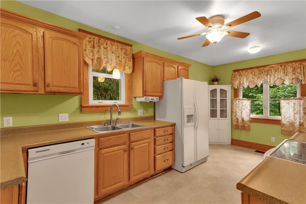 520 Edgewood Road Beaver Falls, PA 15010 - Photo 8 of 29 Updated Eat-In Kitchen with solid oak cabinetry.