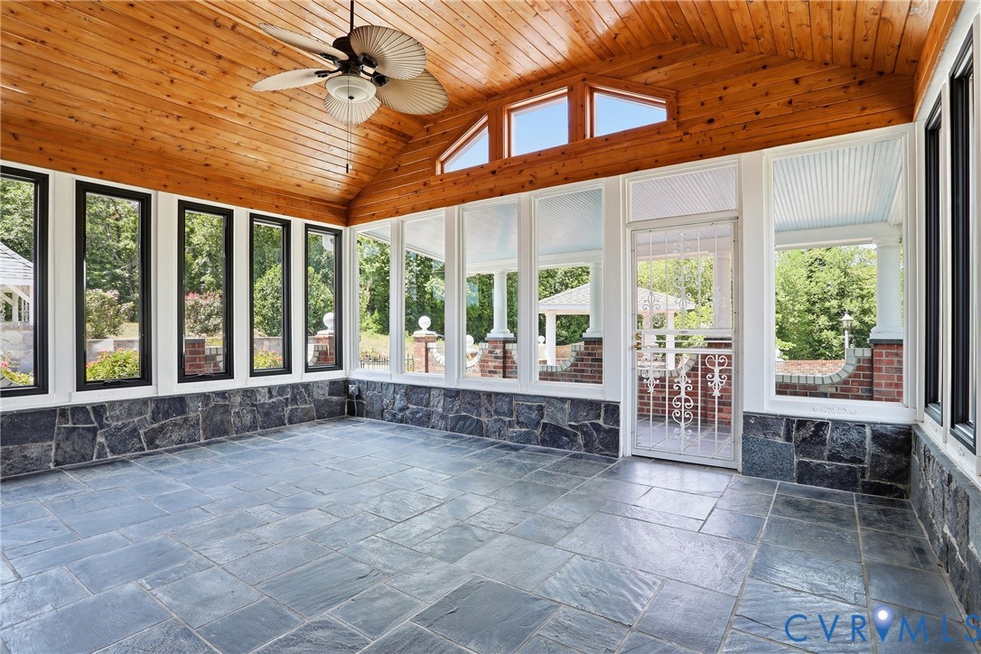 13300 West Patrick Henry Road Doswell, VA 23047 - Photo 38 of 69 Spacious sunroom featuring bluestone tile flooring