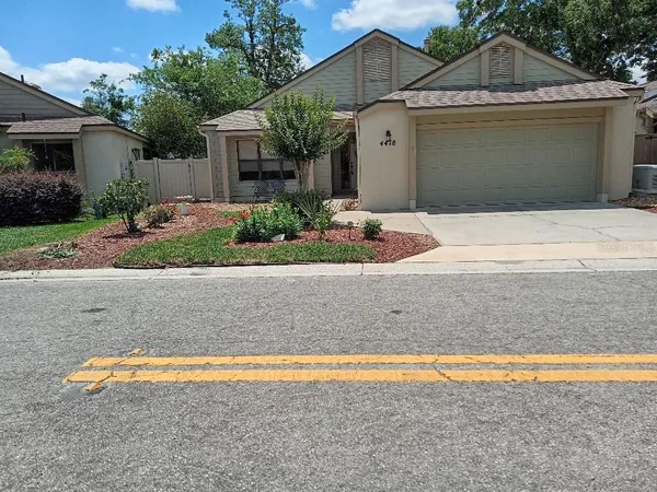 a front view of house with yard