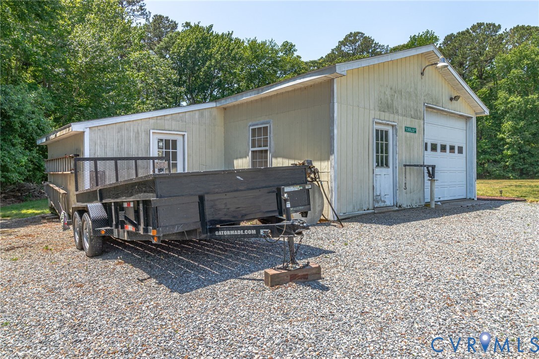 4400 Hacks Neck Road Heathsville, VA 22473 - Photo 65 of 78 a view of a house with backyard and sitting area