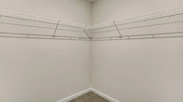 a view of a room with racks on the wall