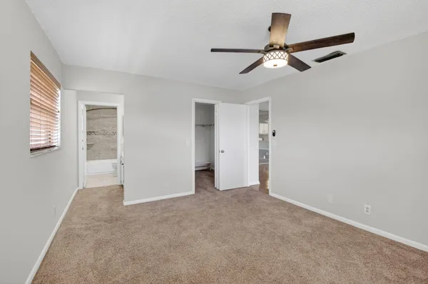 a view of room with racks on the wall