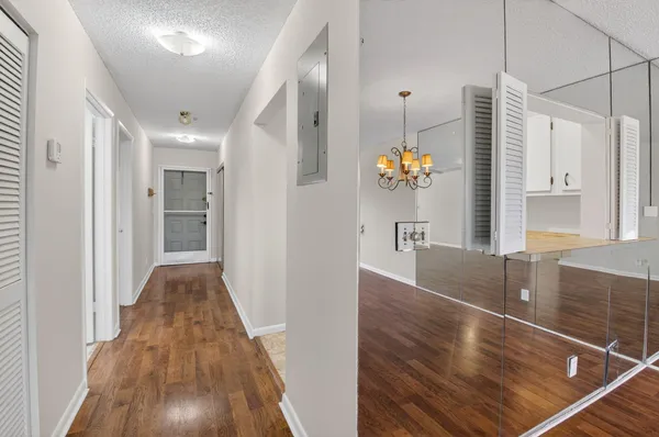 a kitchen with appliances cabinets and a sink