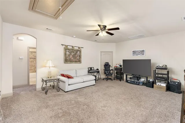 an aerial view of residential houses with outdoor space and river