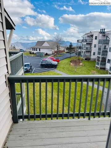 a view of swimming pool from a balcony