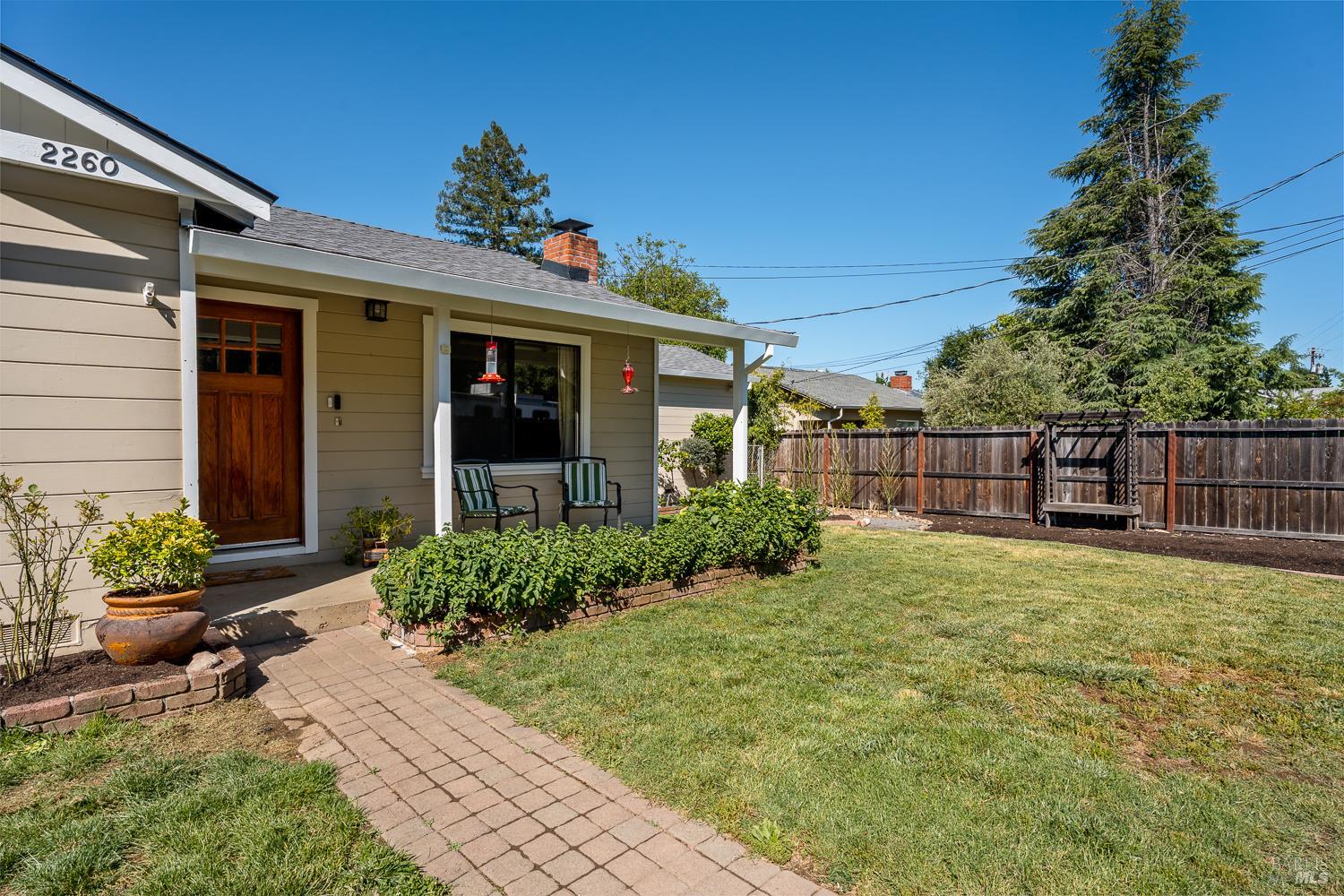 2260 Old River Road Ukiah, CA 95482 - Photo 2 of 29 a front view of a house with garden