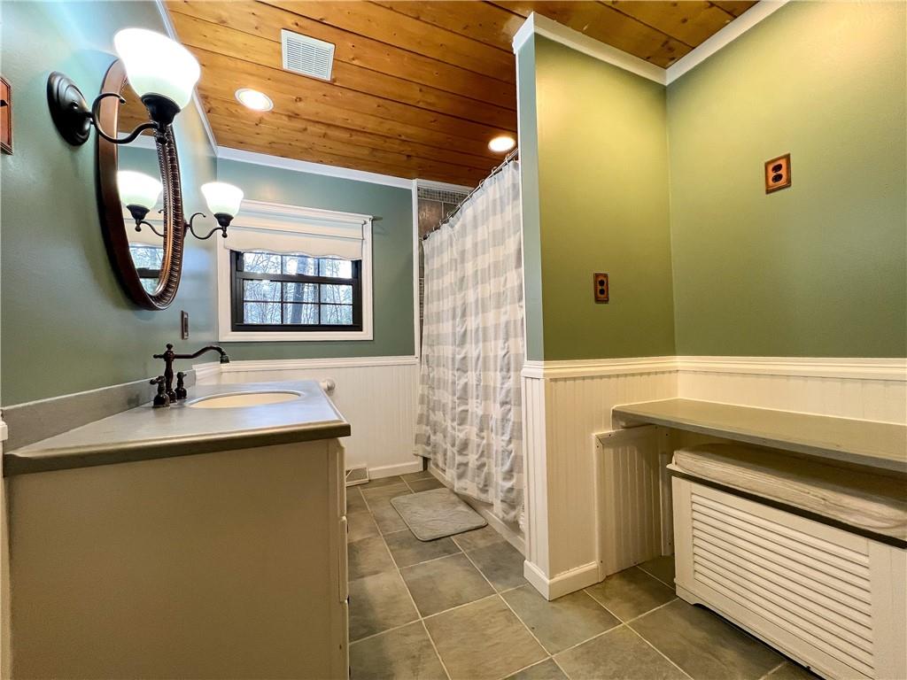 110 Zetta Lane Butler, PA 16002 - Photo 20 of 36 a bathroom with a sink a toilet and mirror