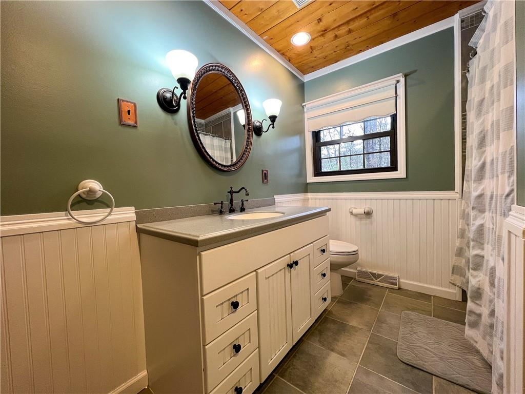 110 Zetta Lane Butler, PA 16002 - Photo 21 of 36 a bathroom with a sink and a mirror