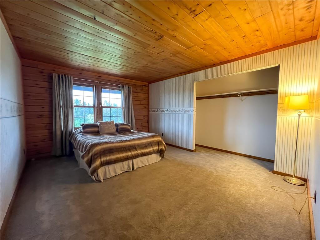 110 Zetta Lane Butler, PA 16002 - Photo 22 of 36 a bedroom with a bed and a walk in closet