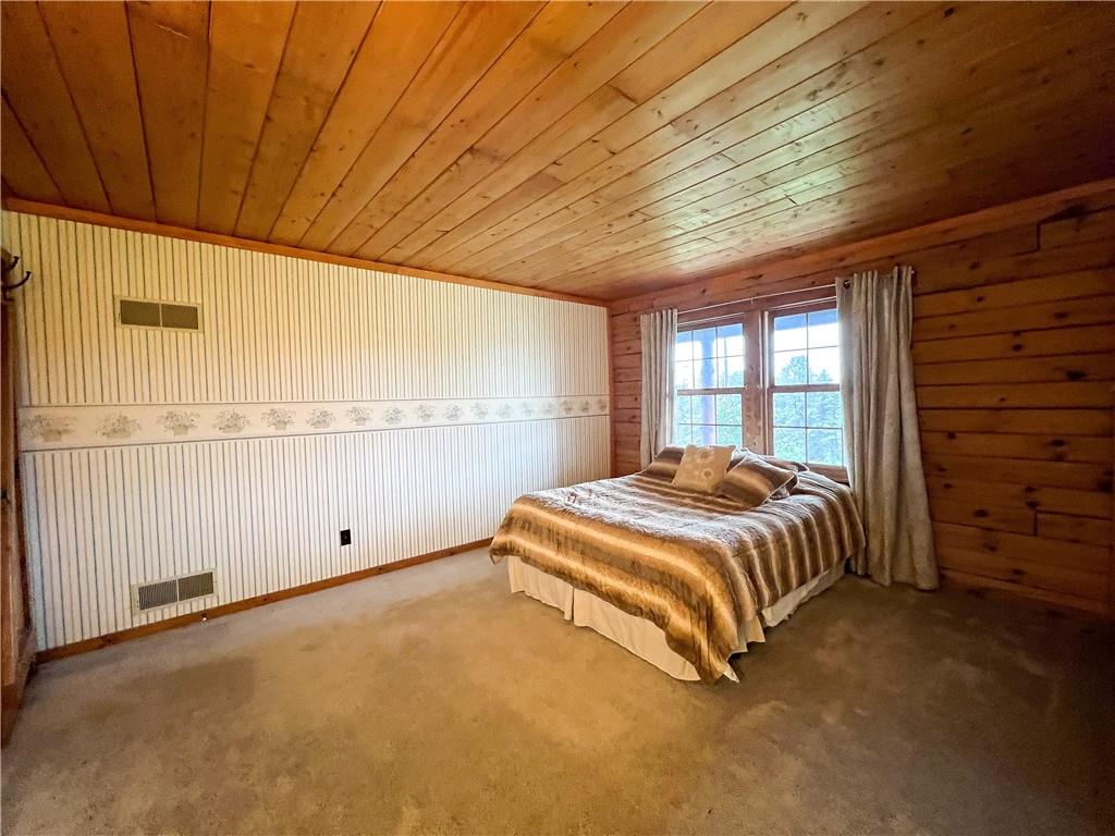 110 Zetta Lane Butler, PA 16002 - Photo 23 of 36 a spacious bedroom with a bed and a window