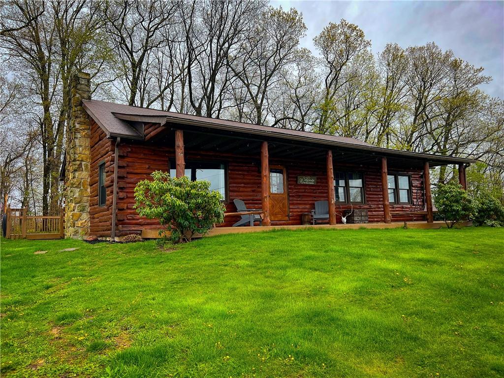 110 Zetta Lane Butler, PA 16002 - Photo 31 of 36 a front view of a house with a garden