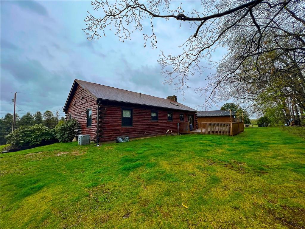 110 Zetta Lane Butler, PA 16002 - Photo 33 of 36 a view of a backyard with wooden fence and a bench