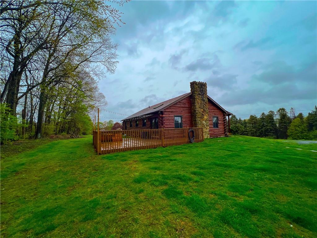110 Zetta Lane Butler, PA 16002 - Photo 34 of 36 a view of a big house with a big yard and large trees