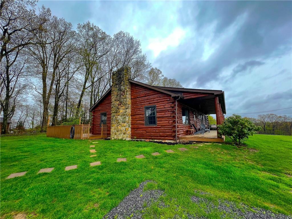 110 Zetta Lane Butler, PA 16002 - Photo 35 of 36 a view of a house with a yard and sitting area