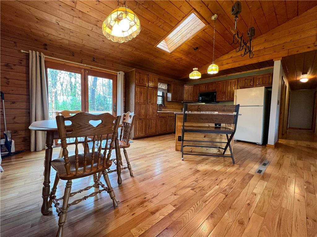 110 Zetta Lane Butler, PA 16002 - Photo 9 of 36 a view of a dining room with furniture window and wooden floor