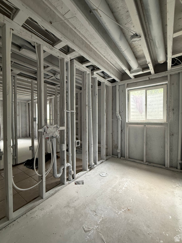 838 East Mountain Road Logan, UT 84321 - Photo 29 of 37 Unfinished interior space with exposed framing and visible plumbing