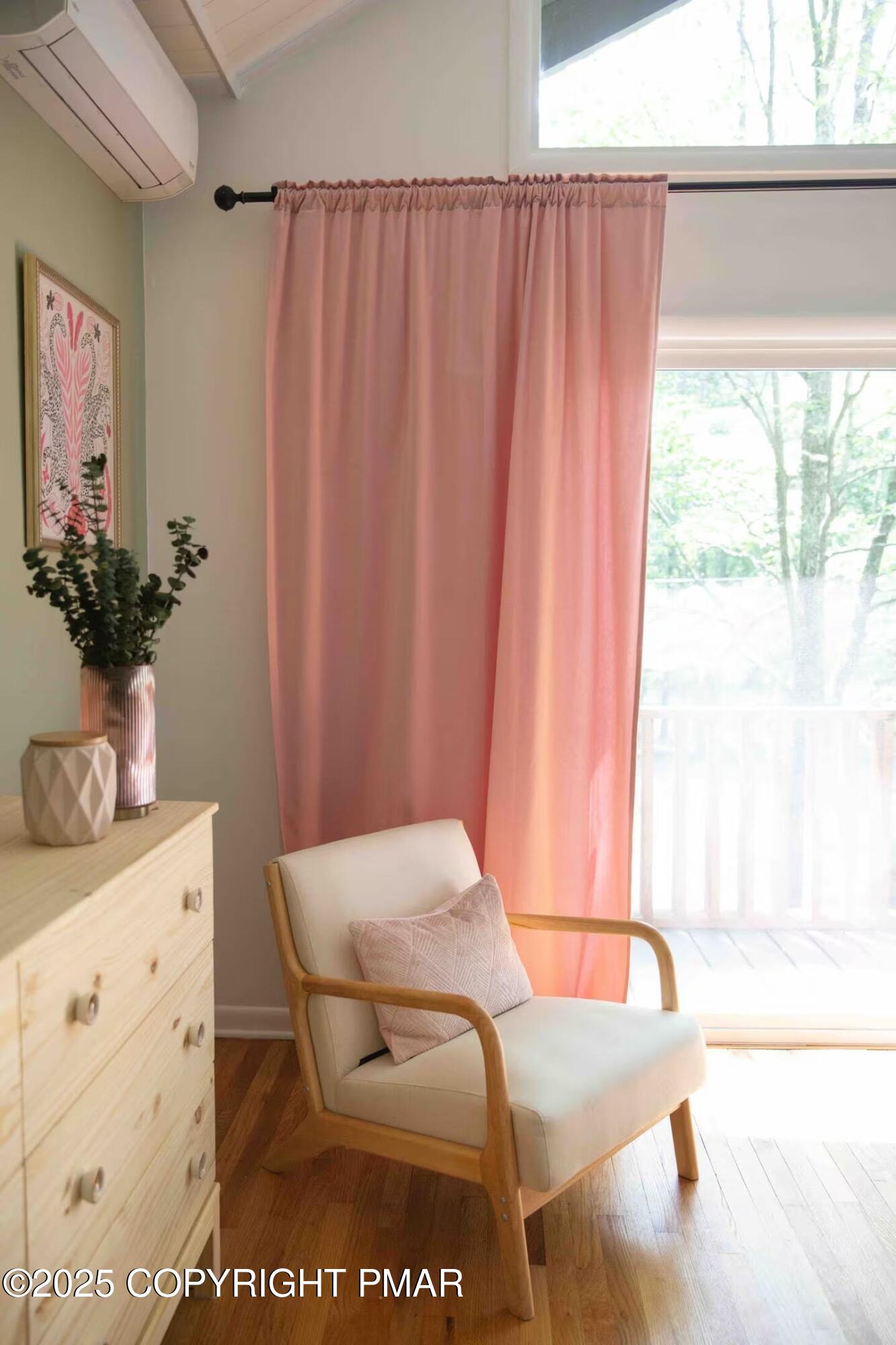 1242 Shadblow Road Pocono Summit, PA 18346 - Photo 28 of 46 a view of a bedroom with a bed and a window in it