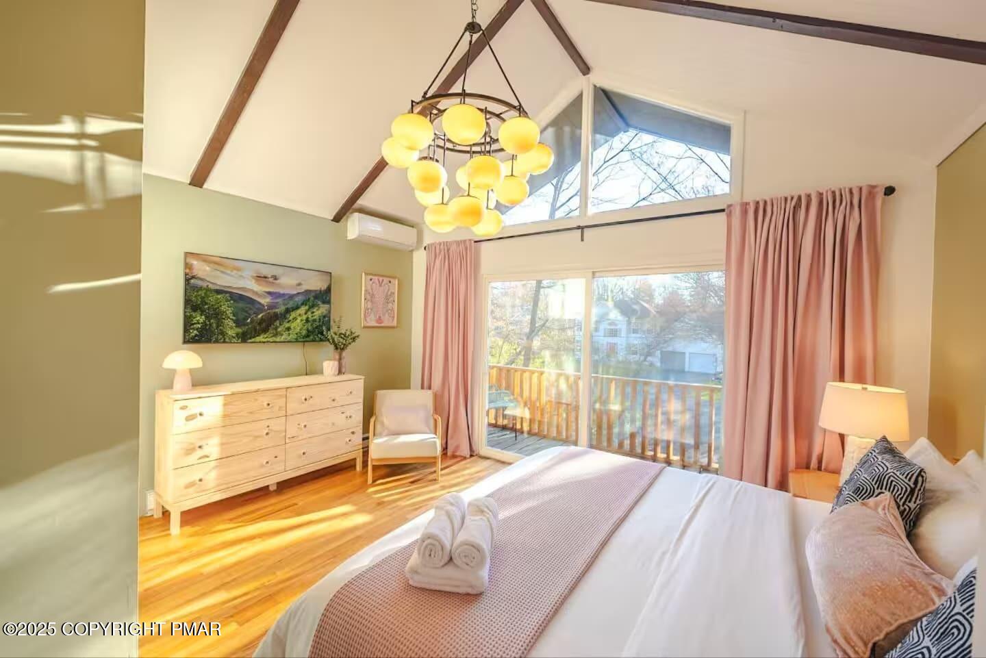 1242 Shadblow Road Pocono Summit, PA 18346 - Photo 29 of 46 a bedroom with a bed and a window