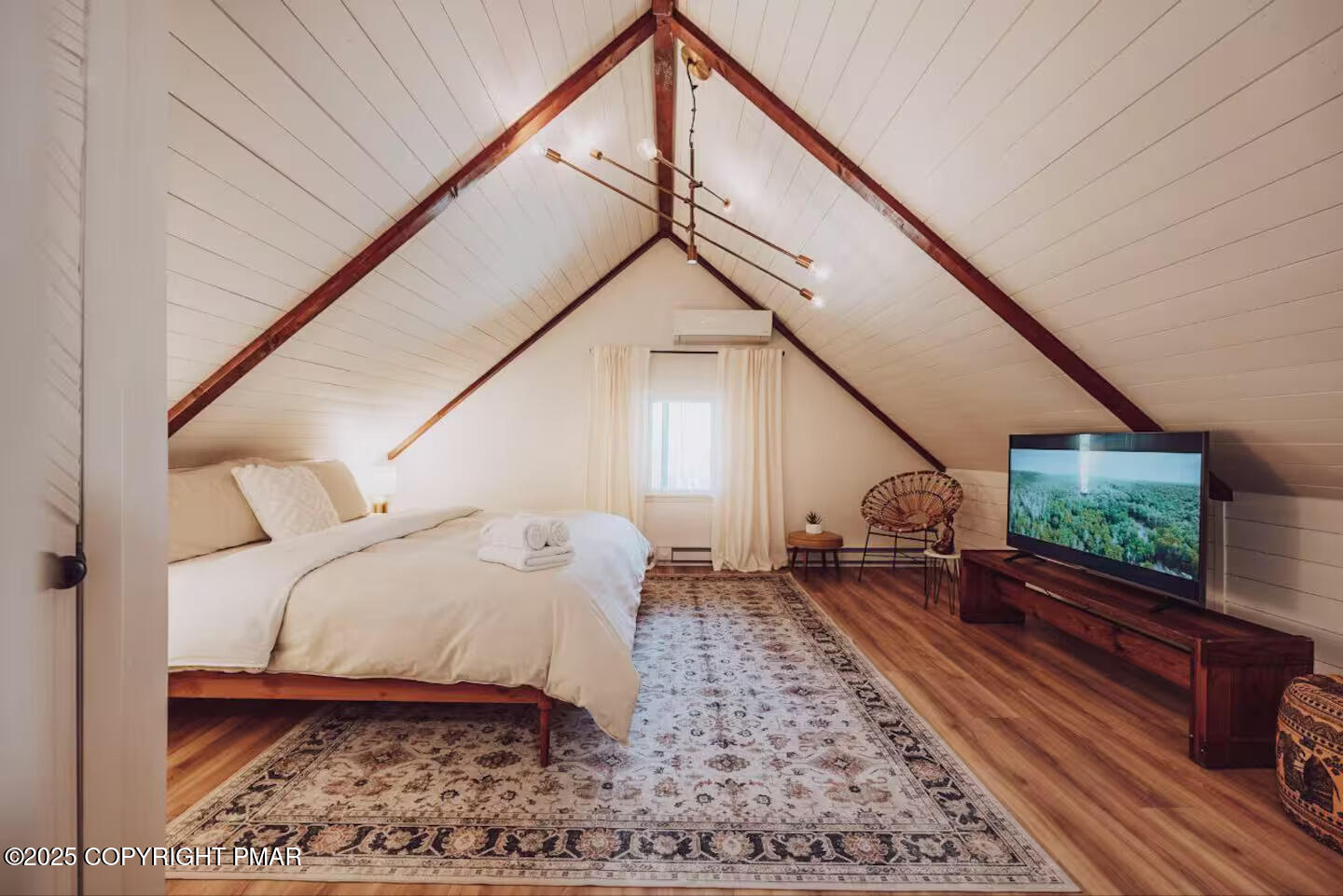 1242 Shadblow Road Pocono Summit, PA 18346 - Photo 36 of 46 a living room with a couch