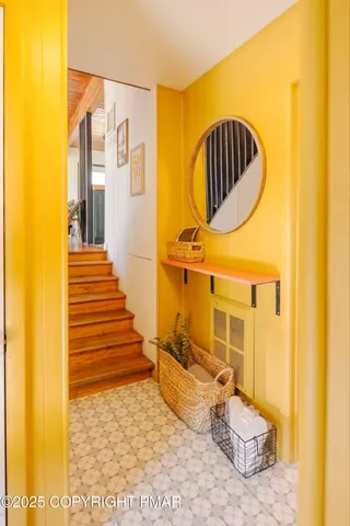 a bathroom with a sink and mirror