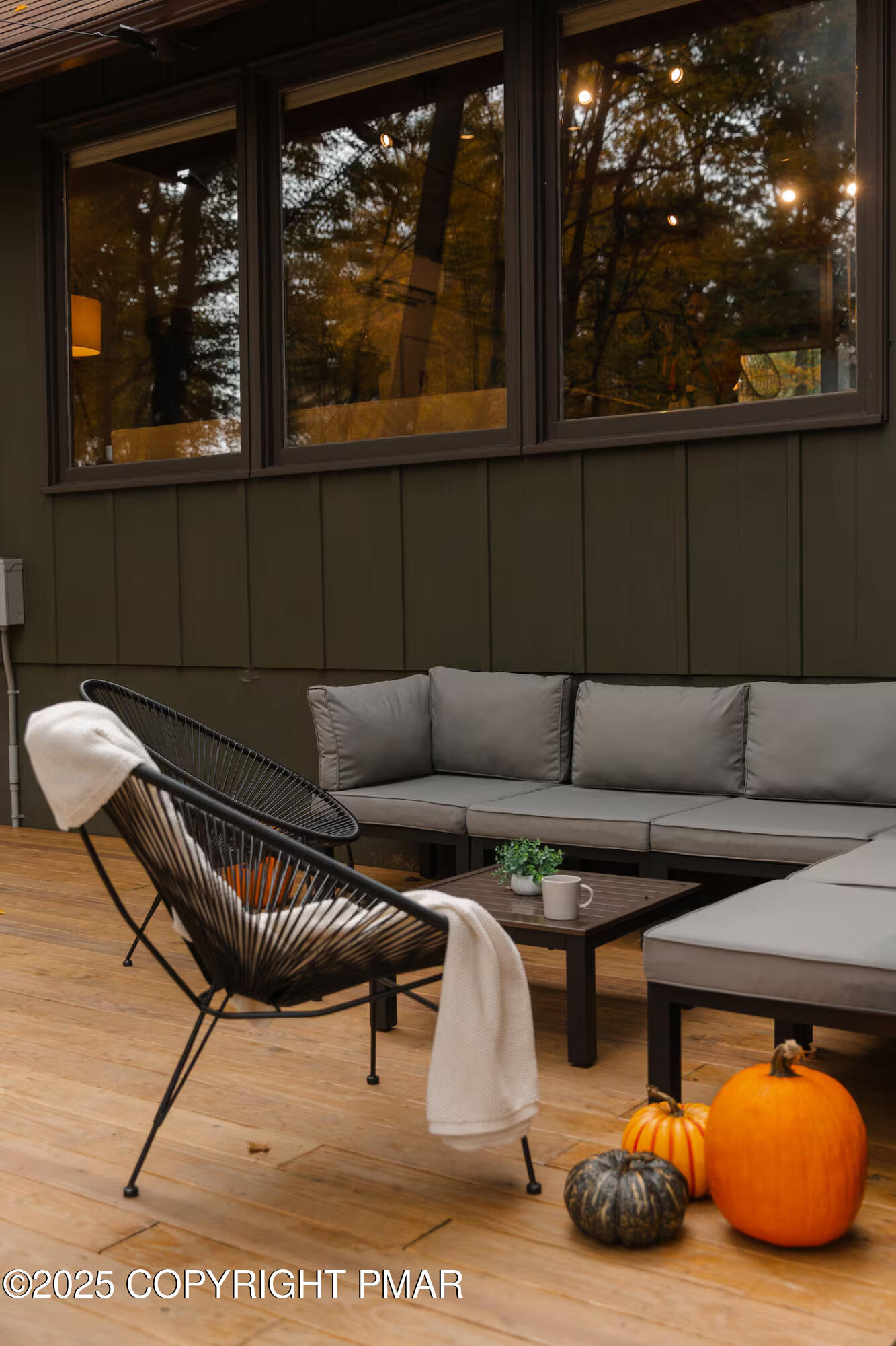 1242 Shadblow Road Pocono Summit, PA 18346 - Photo 8 of 46 a living room with furniture and a floor to ceiling window