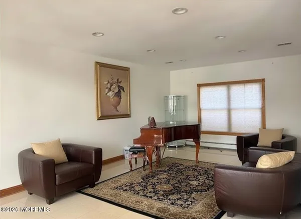a view of a closet area with an empty room