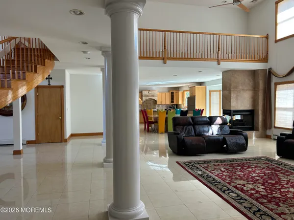 a living room with furniture and a window