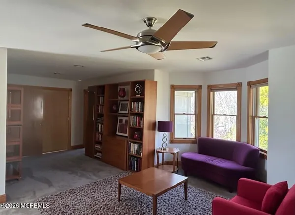 a view of a livingroom with furniture