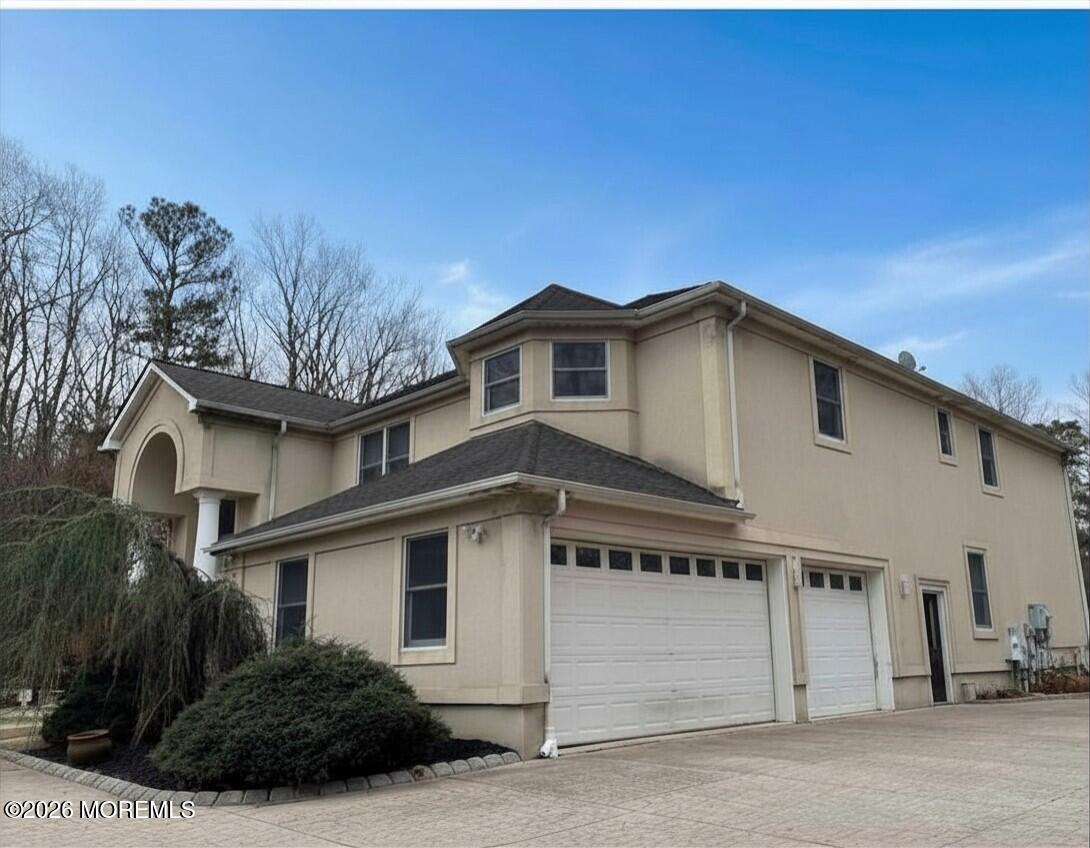 785 Green Valley Road Jackson, NJ 08527 - Photo 6 of 62 side showing garage