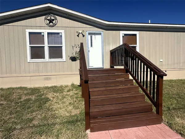 a house view with a outdoor space