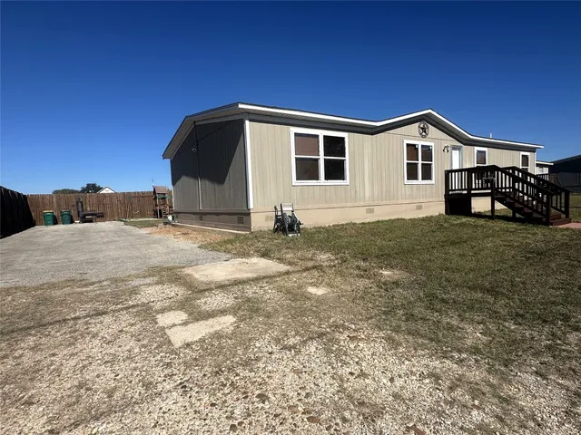 a house view with a outdoor space